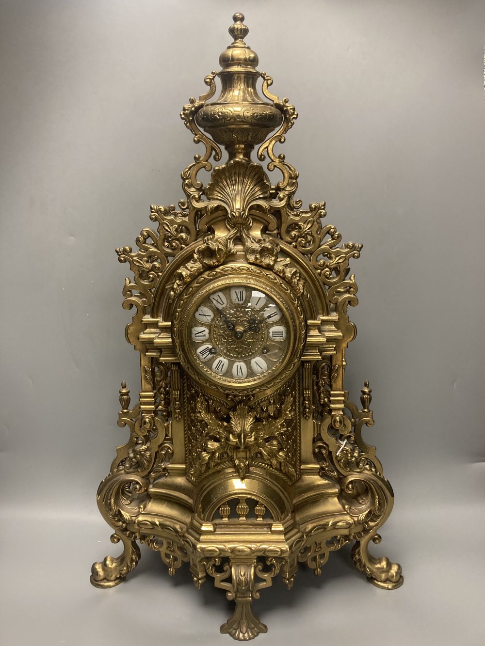 A large 20th century German brass mantel clock, 61cm
